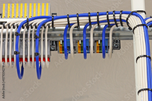 Connection of electrical modules using insulated copper electrical wires. Close-up. Soft focus.