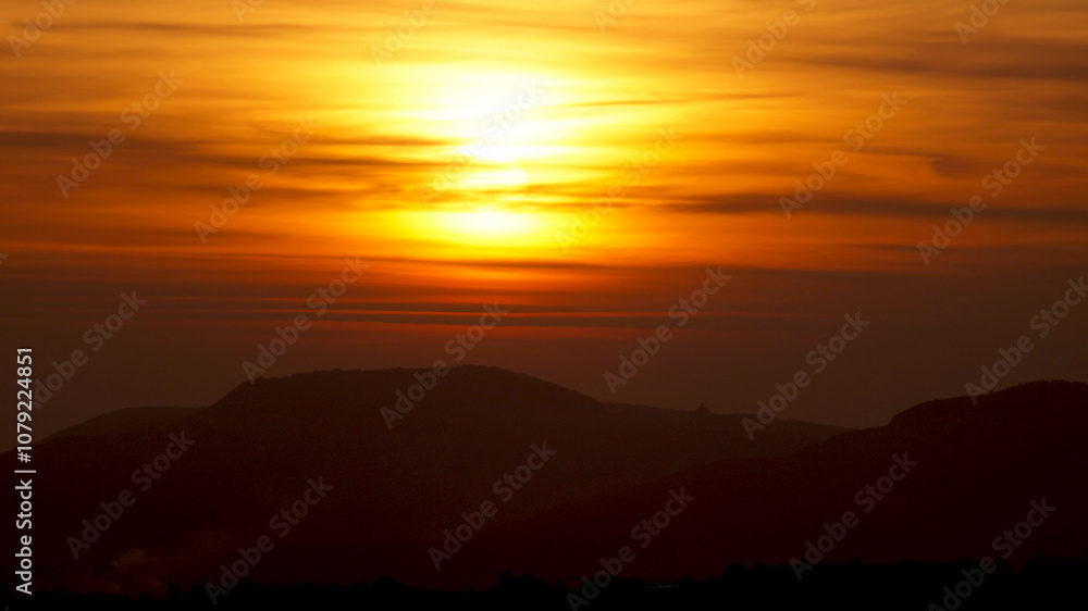 Red sunset on the mountain background Red sunset on the mountain background