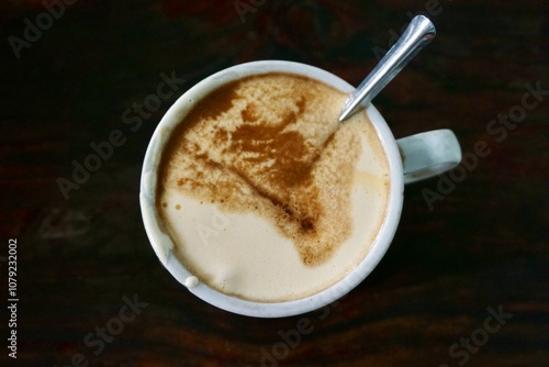 Cup of egg coffee in Hanoi, Vietnam photo