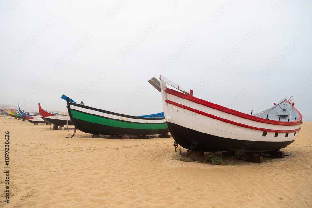 Fototapeta premium The famous Nazaré beach in cloudy weather