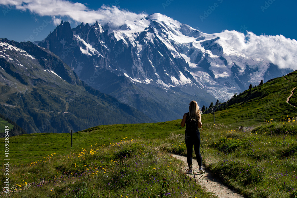 Woman tourist with Mont Blanc in the background in France. The Alps and the highest peak in Europe, Woman tourist with Mont Blanc in the background in France. The Alps and the highest peak in Europe,