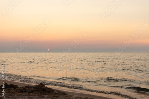 Sunset over Lake Michigan beach photo