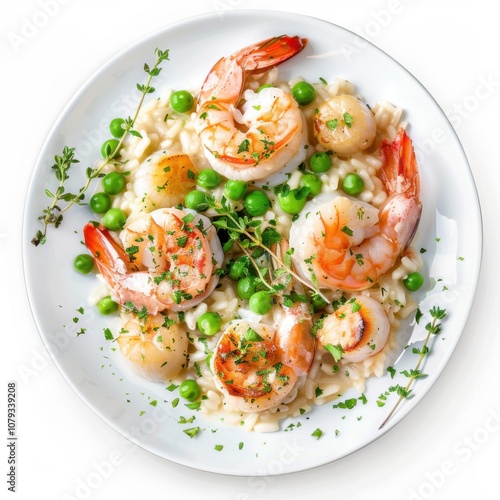 A plate of seafood risotto with shrimp, scallops, and peas