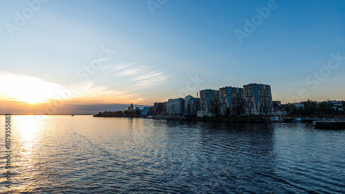 sunset on the background of the Severnaya Dvina River and the city of Arkhangelsk Russia. natural light. photo