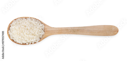 Raw rice in wooden spoon isolated on white, top view