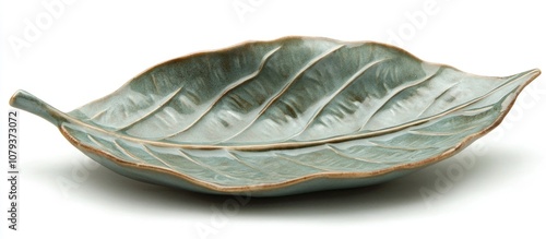 Glazed ceramic dish shaped like a leaf perfect for serving snacks or decorative display photo