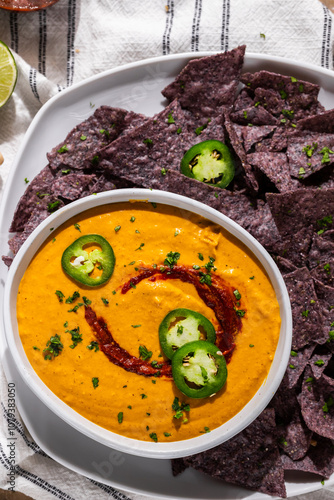 Queso with jalapenos and chips 