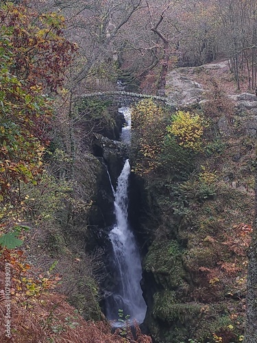 Aira Force waterfalls in the Lake District National Park, England in Autumn photo