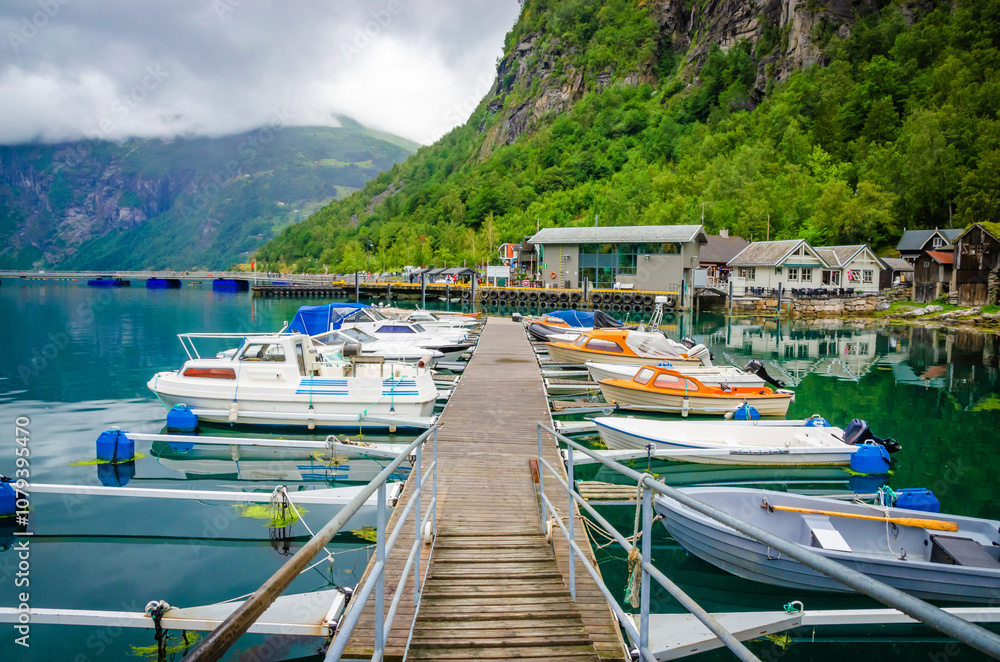 View on the coast and port of Geirangerfjord in town Geiranger, one of the most beautiful fjords in Norway
