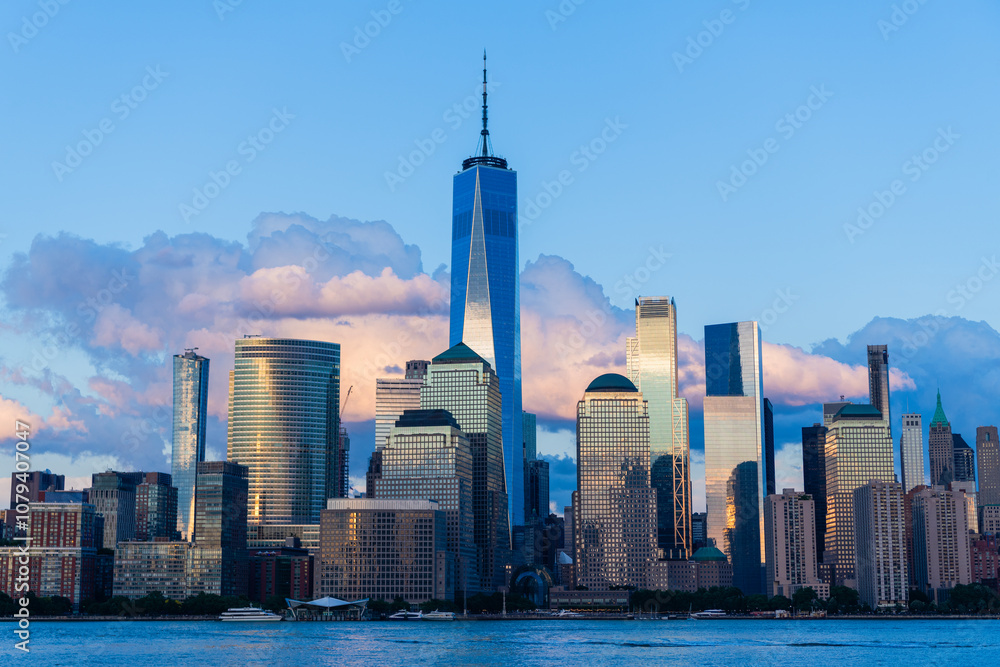 Obraz premium Cityscape of NYC Manhattan. Skyscraper cityscape of downtown city of New York, Manhattan. Manhattan cityscape with skyscraper architecture. Manhattan with NY city skyline. Evening skyline