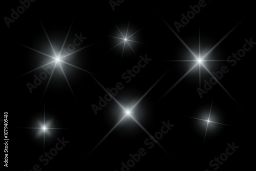 Silver sparkle lights, flashing lights, light effects, sunlight lens flare, glowing ray beams, sparkling starsicon on black background. photo