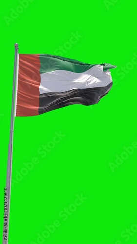 United Arab Emirates Flag on flagpole vertical Cinematic Realistic Motion Waving on green background chroma key