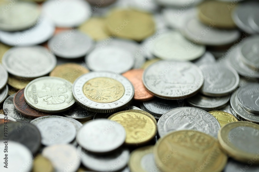 Big pile of different coins from various currencies and different countries around the world. Currency exchange Big pile of different coins from various currencies and different countries around the world. Currency exchange