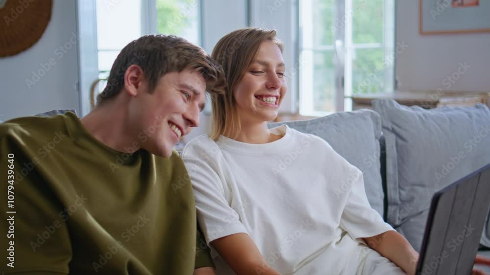Laughing friends greeting tab call at flat closeup. Teenagers pair waving hands Laughing friends greeting tab call at flat closeup. Teenagers pair waving hands