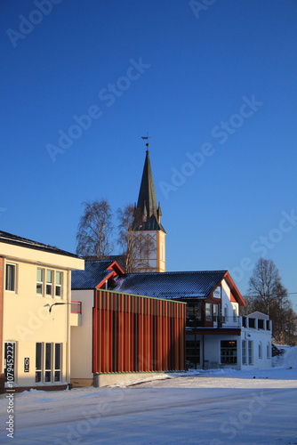 Winter landscapes in Norway showcase serene snowy mountains, icy fjords, and peaceful coastal views. Capturing the beauty of snow-covered trees, quiet roads, and glowing sunsets creates a sense of cal