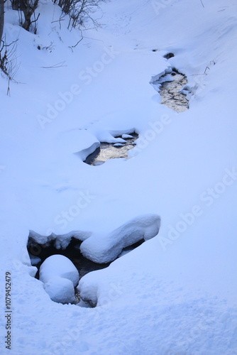 Winter landscapes in Norway showcase serene snowy mountains, icy fjords, and peaceful coastal views. Capturing the beauty of snow-covered trees, quiet roads, and glowing sunsets creates a sense of cal