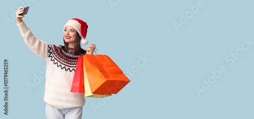 Pretty young woman in Santa...