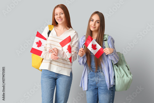 Female students with backpa...