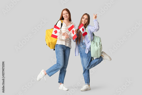 Female students with backpa...