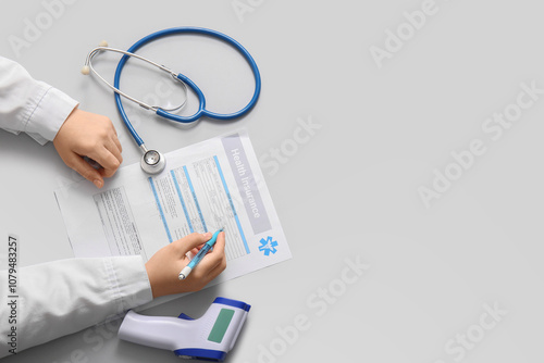Doctor hands writing on med...