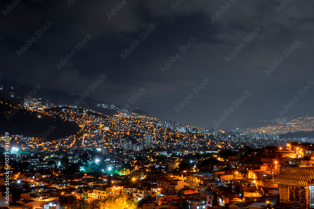Fototapeta premium Medellin, Antioquia, Colombia. October 10, 2022. Famous District 13 of Medellin, Colombia, South America at night