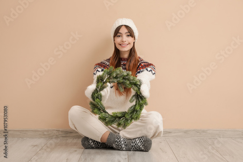 Young woman with mistletoe ...