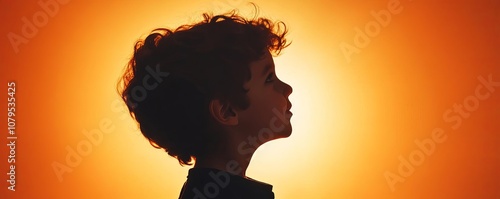 Child s silhouette in sunlight, playful moment, diffused light photo