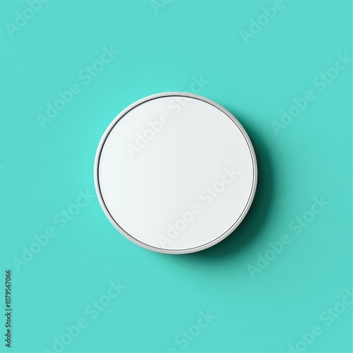 Minimalist Round White Frame with Silver Trim on a Turquoise Background.