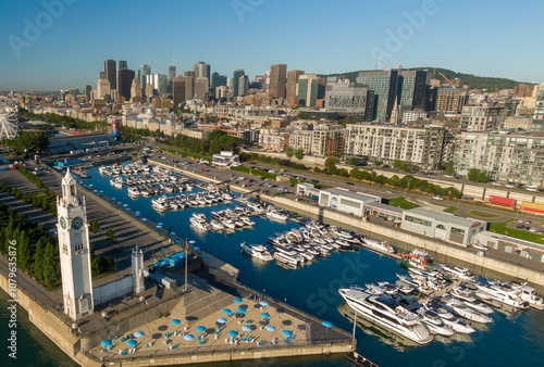 Vieux-Port de Montréal, boats, clocktower and the city skyline Montreal, Quebec, Canada.