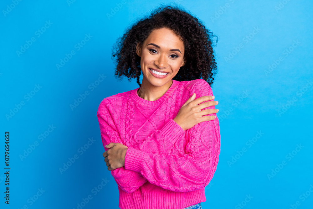 Fototapeta premium Photo portrait of attractive young woman hug self enjoy warmth dressed stylish pink clothes isolated on blue color background