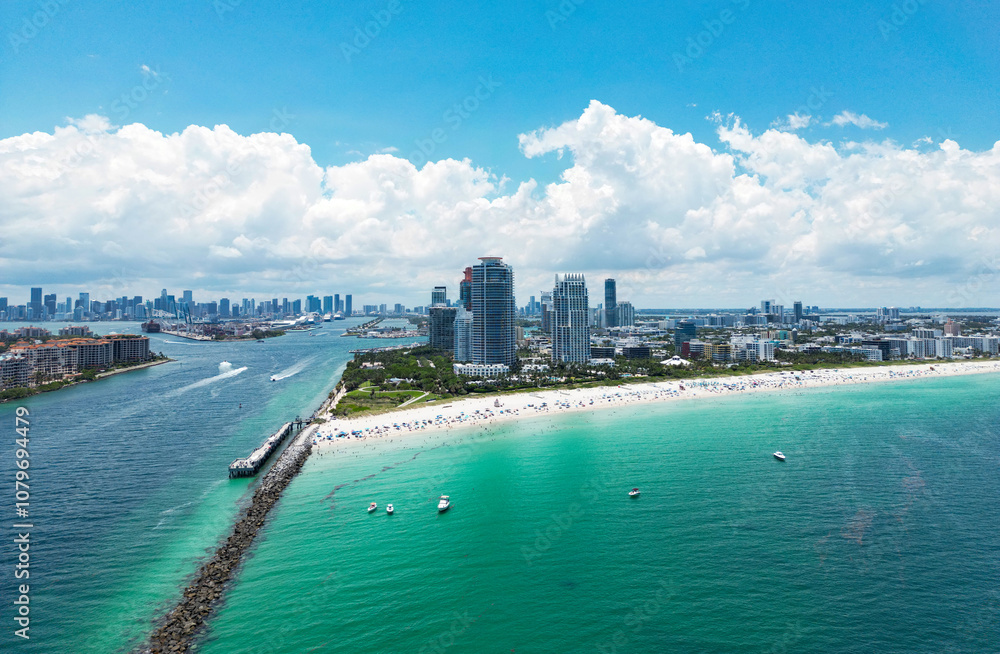 Aerial view of South Pointe Park. Miami Beach. Florida. USA. Summer holidays in Miami Beach. Aerial panoramic view of the city of Miami, buildings, marina, yachts and luxurious apartments. Aerial view of South Pointe Park. Miami Beach. Florida. USA. Summer holidays in Miami Beach. Aerial panoramic view of the city of Miami, buildings, marina, yachts and luxurious apartments.