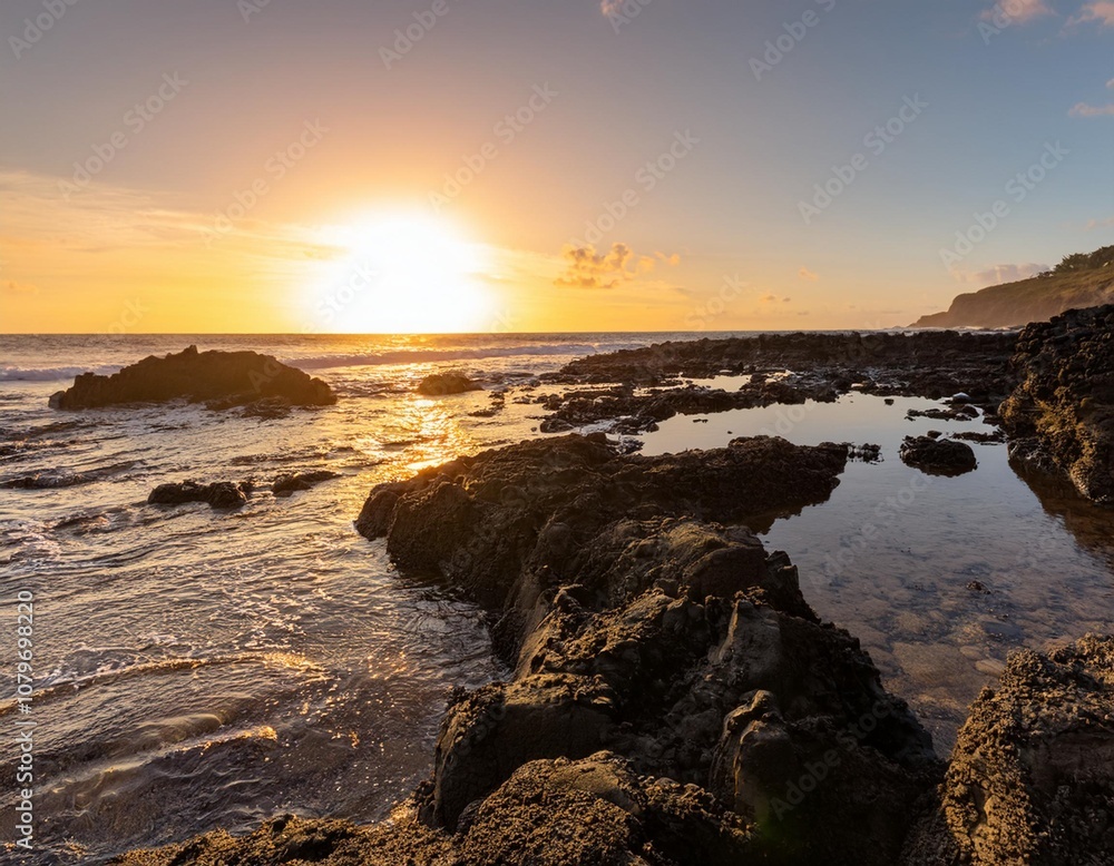 Obraz premium Rocky Beach With Jagged Black Rocks and Shimmering Tide Pools Reflecting the Colors of the Setting Sun, With Waves Gently Crashing on the Shore in the Distance