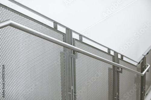 Stainless steel perf railing system, Single flat bar posts provide clean lines and minimal obstruction to line of sight.