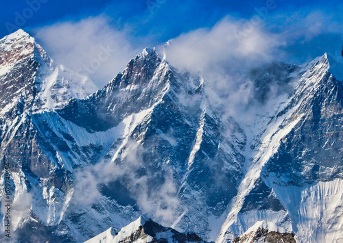 Cuadro en lienzo Clouds rising obscure the three summits of the Lhotse range,including Lhotse Mai