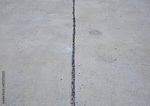 The concrete road in the middle has a welding groove. photo