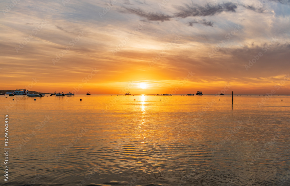 Beautiful red and orange sunrise over the sea. Beautiful red and orange sunrise over the sea.