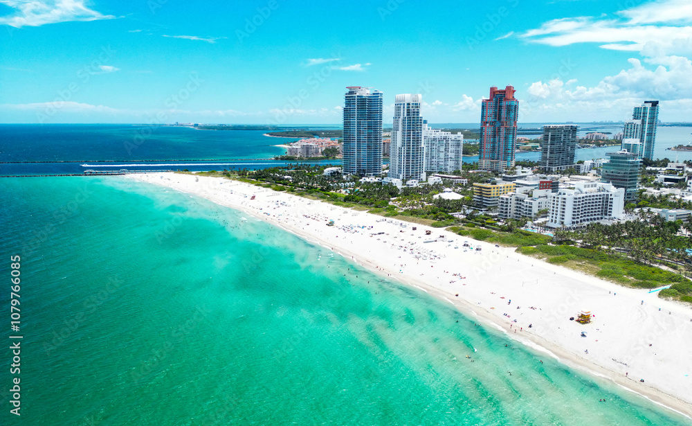 Aerial view of South Pointe Park. Miami Beach. Florida. USA. Summer holidays in Miami Beach. Aerial panoramic view of the city of Miami, buildings, marina, yachts and luxurious apartments. Aerial view of South Pointe Park. Miami Beach. Florida. USA. Summer holidays in Miami Beach. Aerial panoramic view of the city of Miami, buildings, marina, yachts and luxurious apartments.