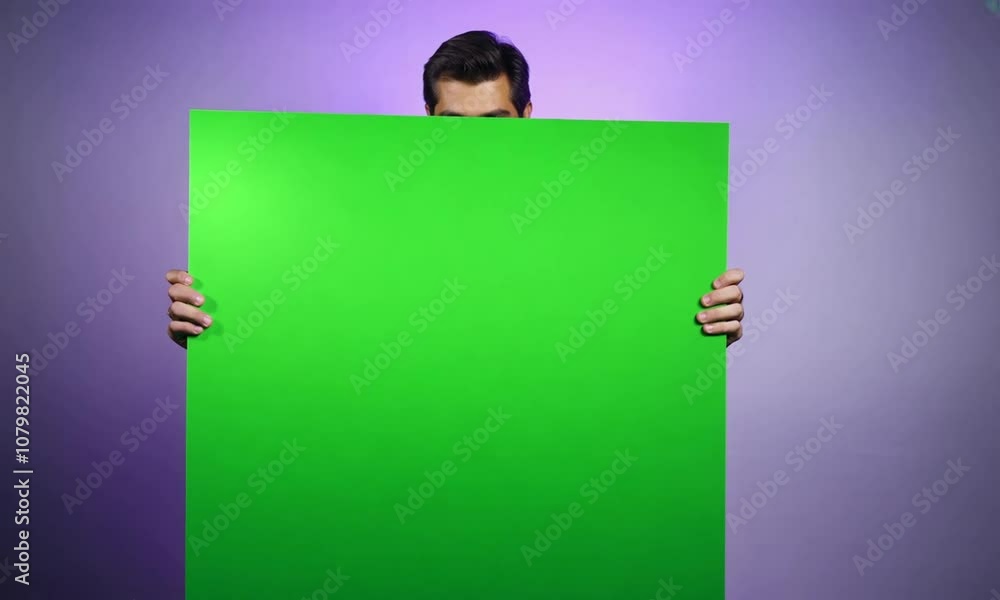 Man, holding a green screen, one color background. Generative AI Man, holding a green screen, one color background. Generative AI