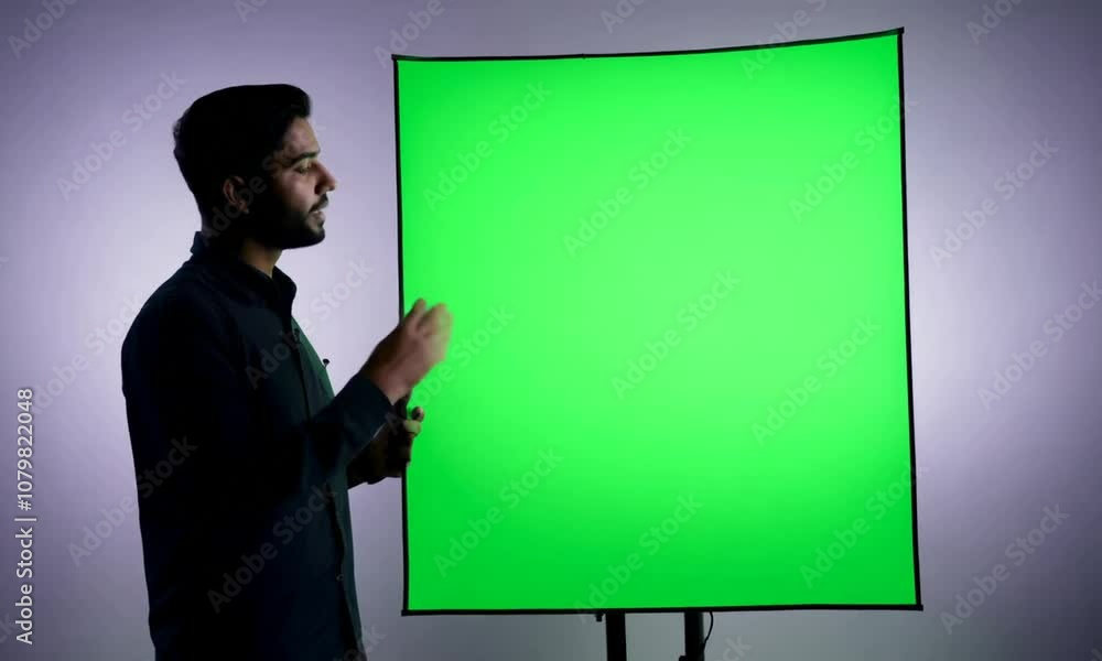 Man, holding a green screen, one color background. Generative AI Man, holding a green screen, one color background. Generative AI