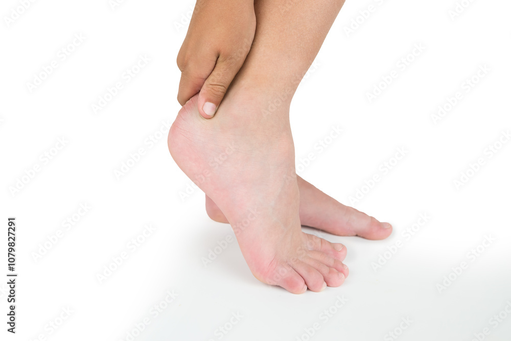 Leg pain, woman standing and feeling pain in leg on white background. ,woman suffering from leg pain holding leg in hands. Leg pain, woman standing and feeling pain in leg on white background. ,woman suffering from leg pain holding leg in hands.