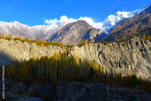 Scenic view of the ridge of Ultar Sar massif that rises precipitously above the Hunza valley (Karakoram mountain range, Gilgit-Baltistan, Pakistan) photo