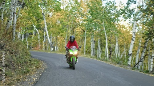 Wallpaper Mural Person on motorcycle riding through autumn canyon road Torontodigital.ca