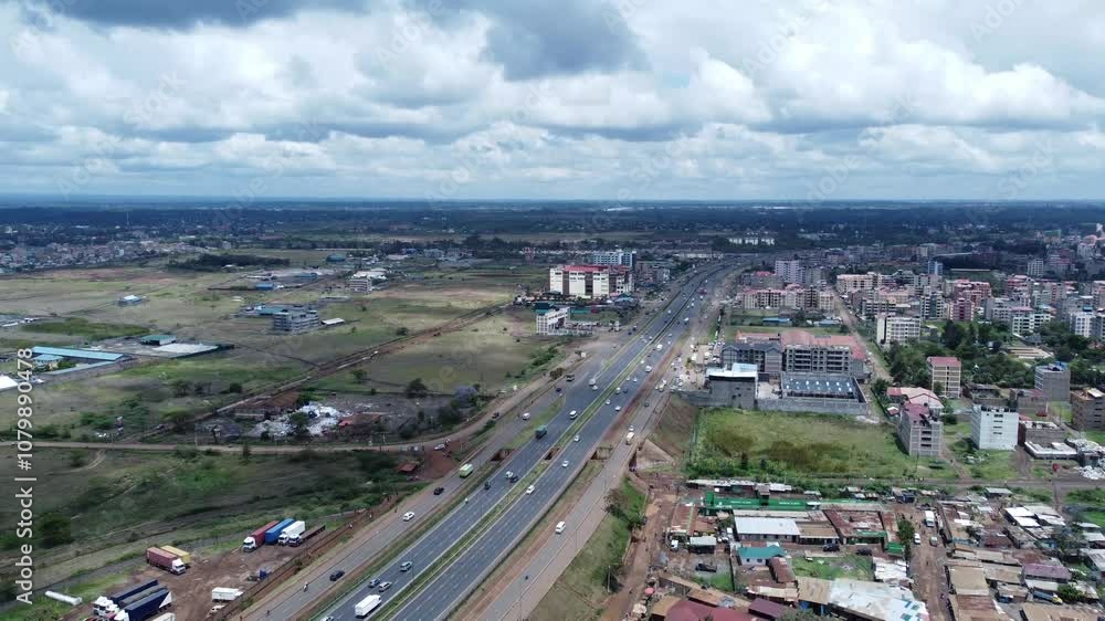 Thika road highway with cars and buildings in ruiru near nairobi, kenya, aerial view Thika road highway with cars and buildings in ruiru near nairobi, kenya, aerial view