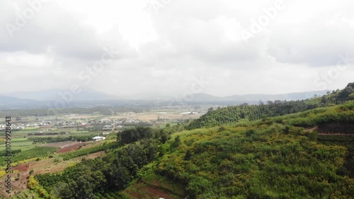 An aerial view, Rcai mountain in Duc Trong district, Lam Dong Vietnam, also known as Doi Mountain, in November Wild sunflowers bloom brightly on R'Chai mountain. 