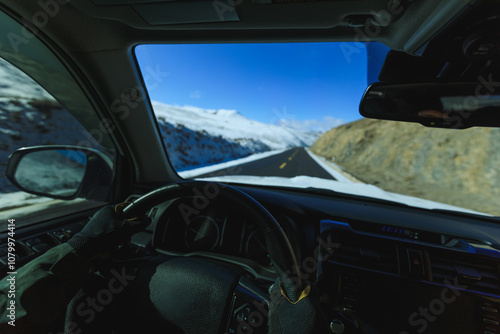 Driving off road car in high altitude mountains in winter Tibet, China