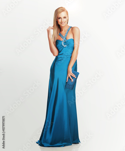 Happy woman, portrait or fashion with satin gown for style, glamour or elegance on a white studio background. Female person, model or stylish outfit with silk, blue dress or purse on mockup space