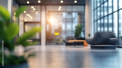 A well-lit modern office space featuring contemporary furniture basks in natural light. The background is intentionally blurred to emphasize the foreground elements. 