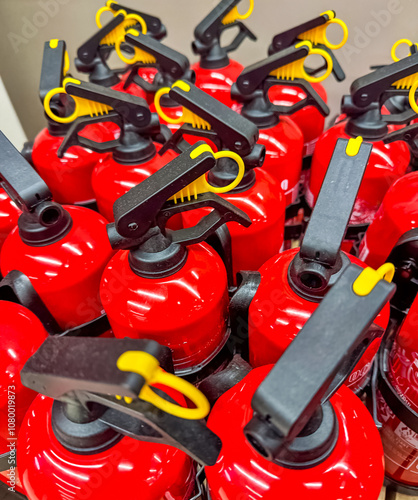 Close-Up of Red Fire Extinguishers in Hardware Store Display. High quality photo photo