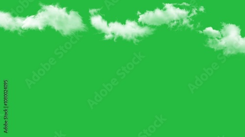 White fluffy clouds on a green screen. Clouds animation moving on green screen background photo