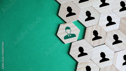 hexagon with the icon of adding new employees or students. Hand adding a new team member to a group. Business management concept photo